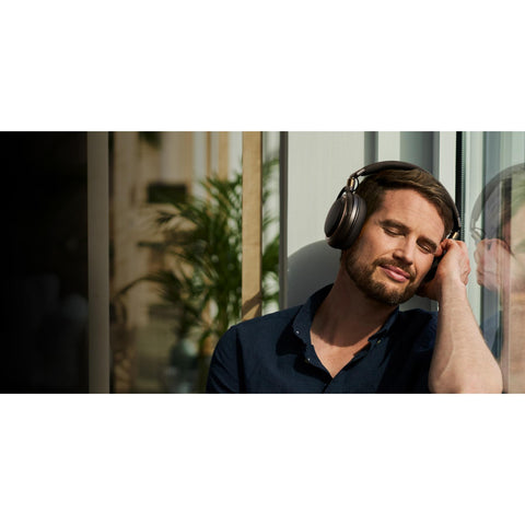 Audio Technica ATH-AL5NC Wireless Open-Back Headphones guy listening (view 5 of 5)