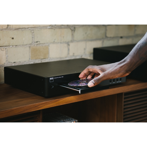 NAD C 589 CD player-lifestyle-disc being loaded (view 4 of 5)